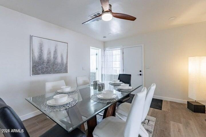 Modern dining room interior showing table and matching chairs