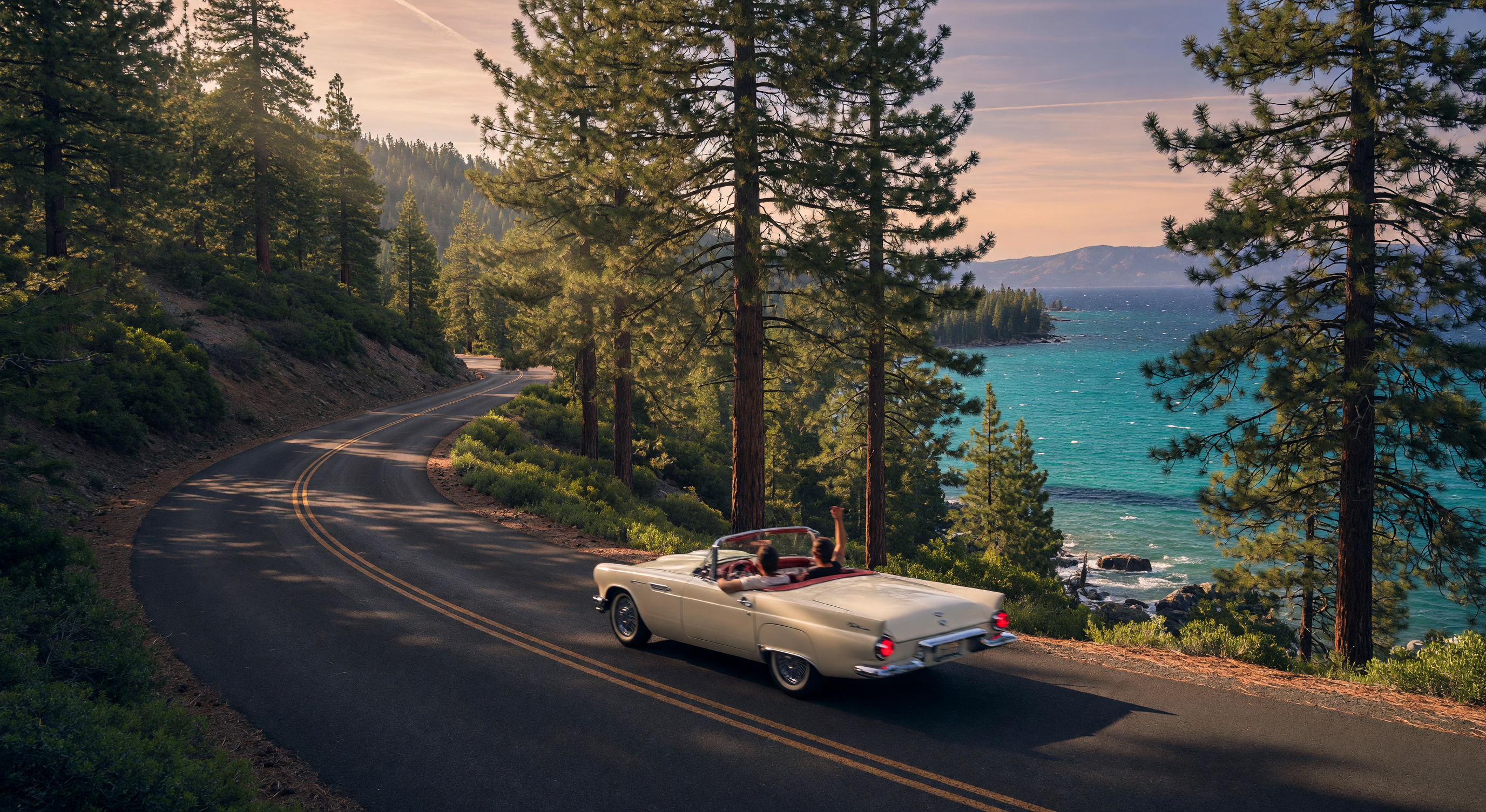 Modern garage workshop in Northern Nevada with classic car and mountain view