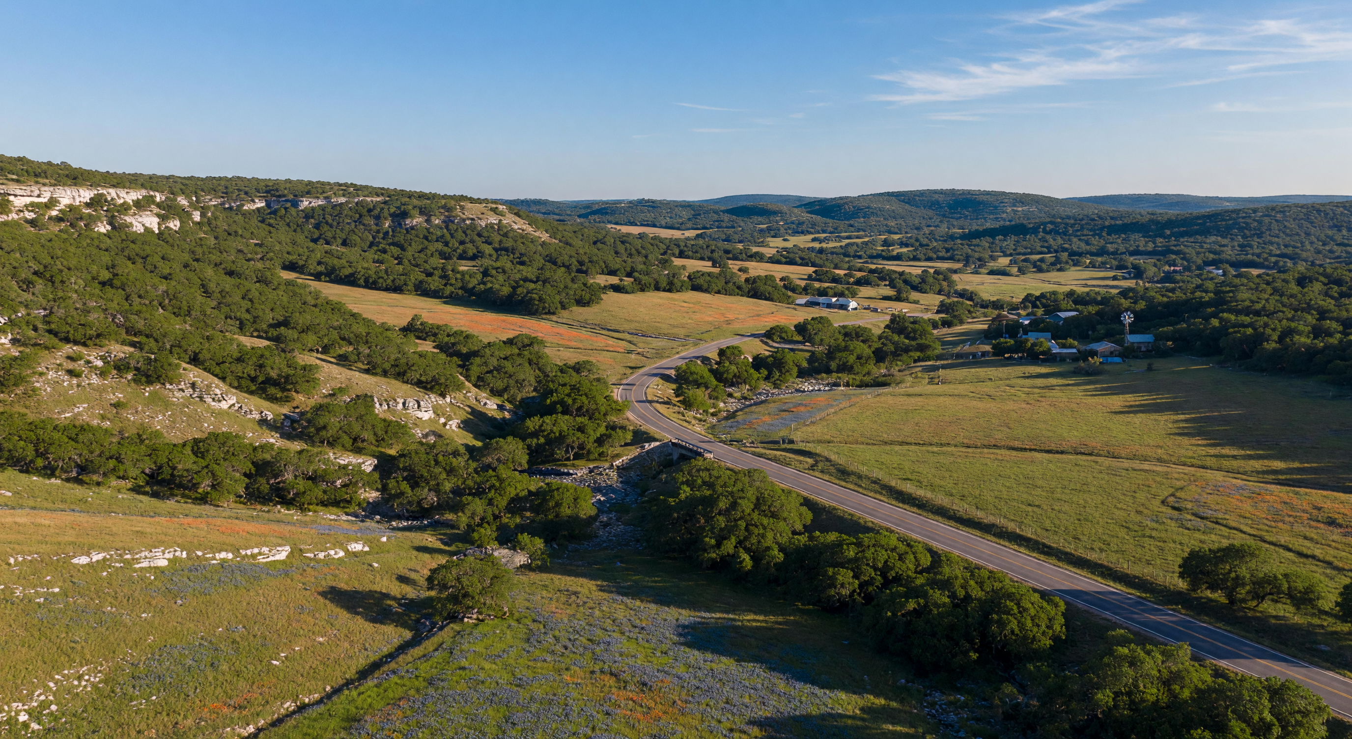 Rolling green hills of the Texas Hill Country near Boerne at golden hour