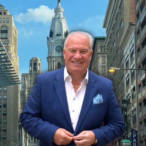 Craig Lerch, Philadelphia real estate broker, with Philadelphia City Hall in the background