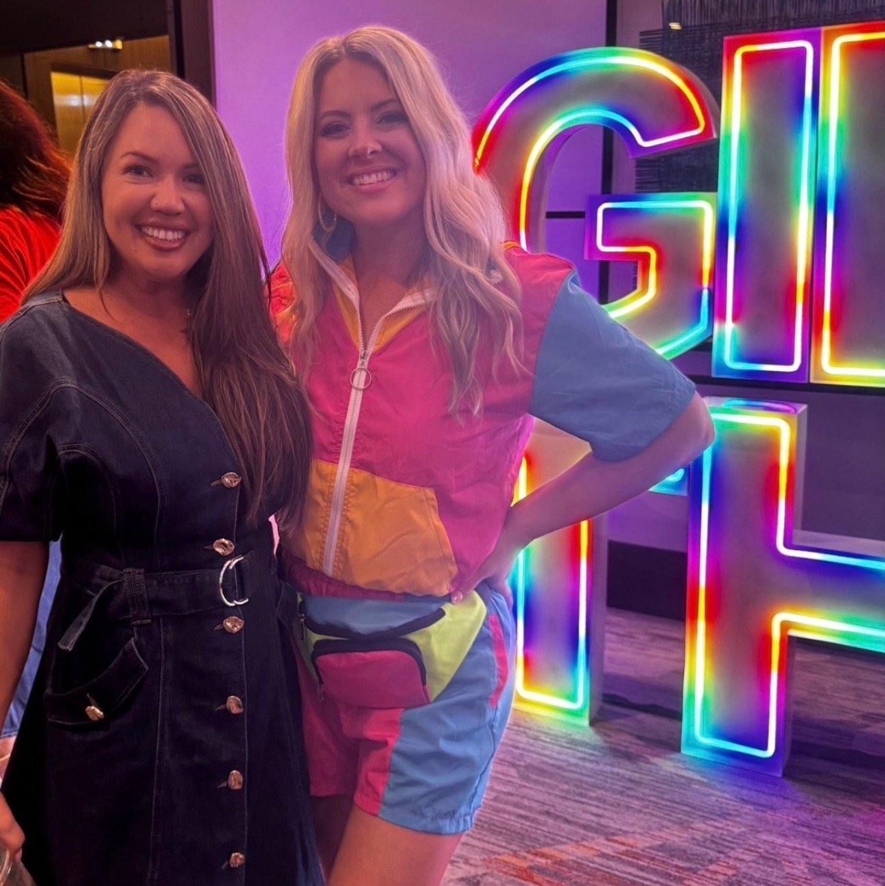 Tiffany Huntoon and Lauren Rocco posing together on an outdoor staircase