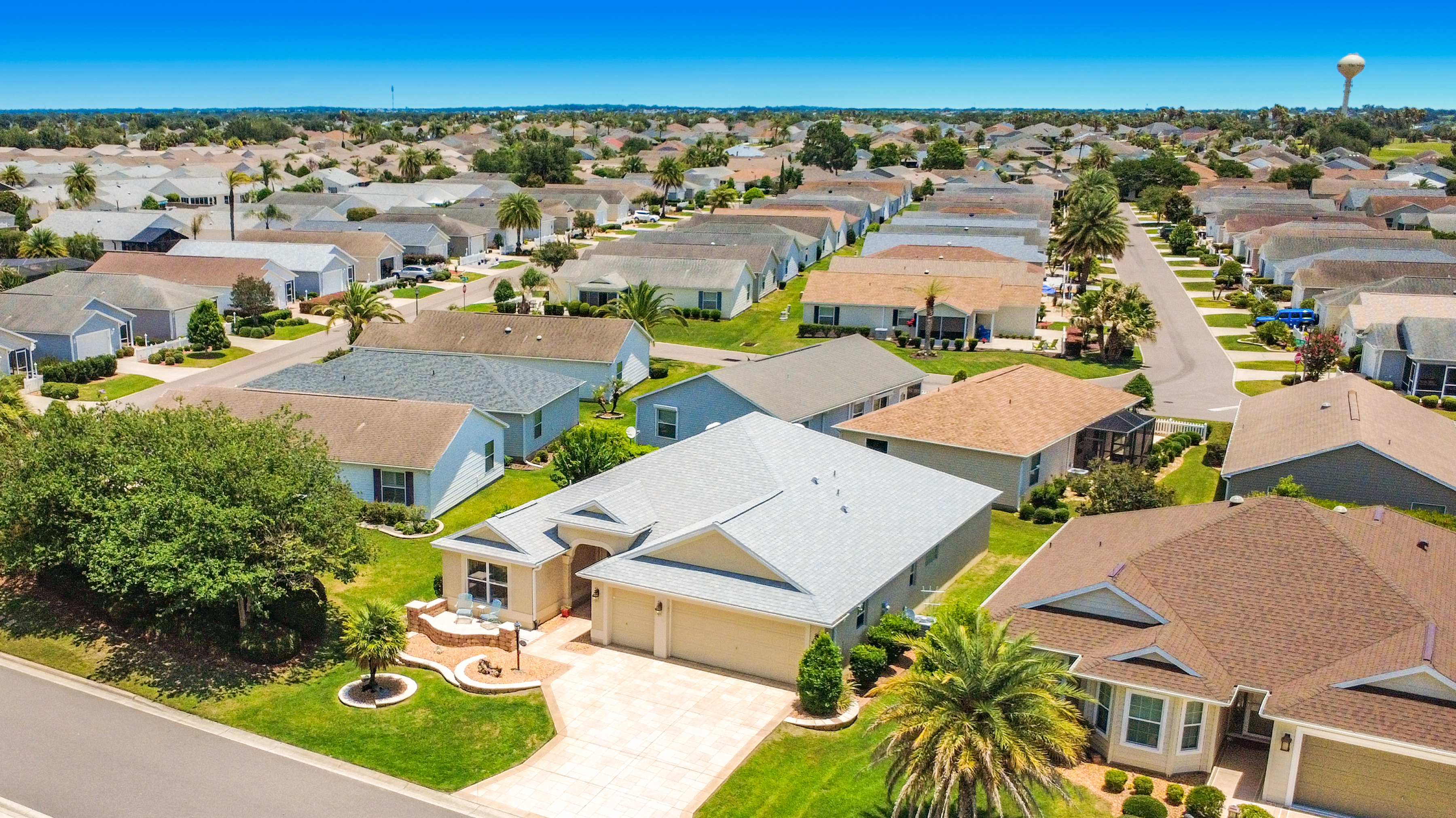 Aerial view of the property and surrounding The Villages neighborhood