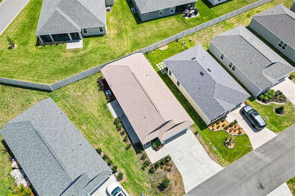 Top-down aerial view of 7185 Fay Ct and the surrounding Villages FL neighborhood