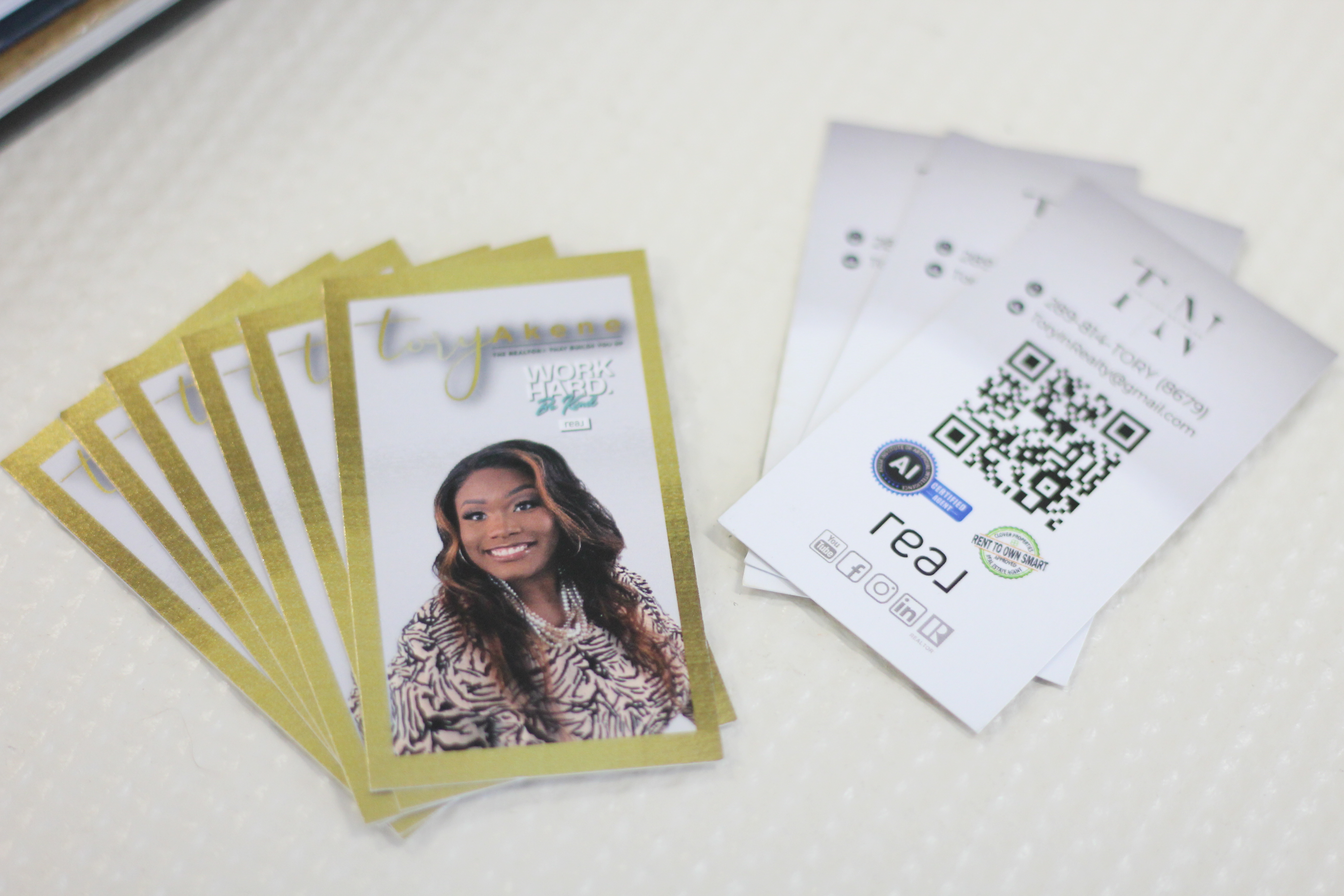 Tory Akene, AI Certified REALTOR® at her desk