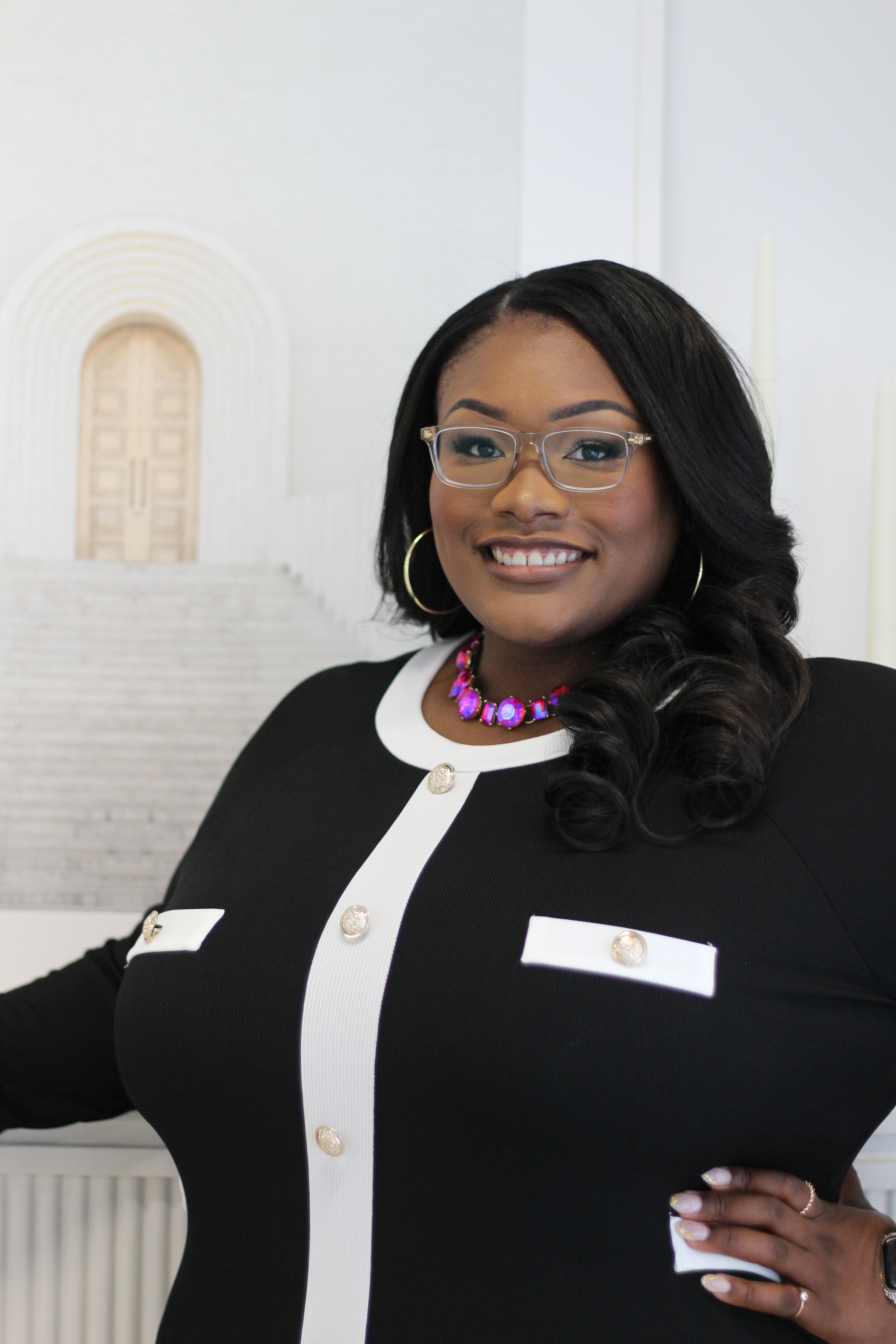 Tory Akene — professional portrait in a bright office