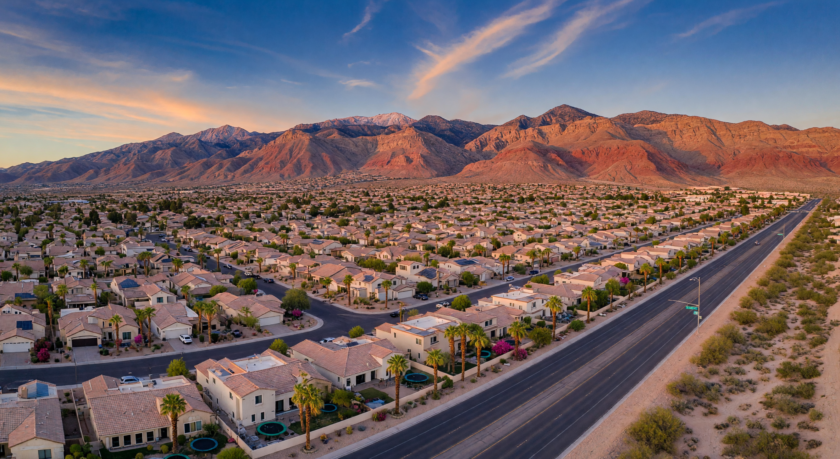 Lone Mountain peak rising above the Las Vegas desert at sunset with warm golden light