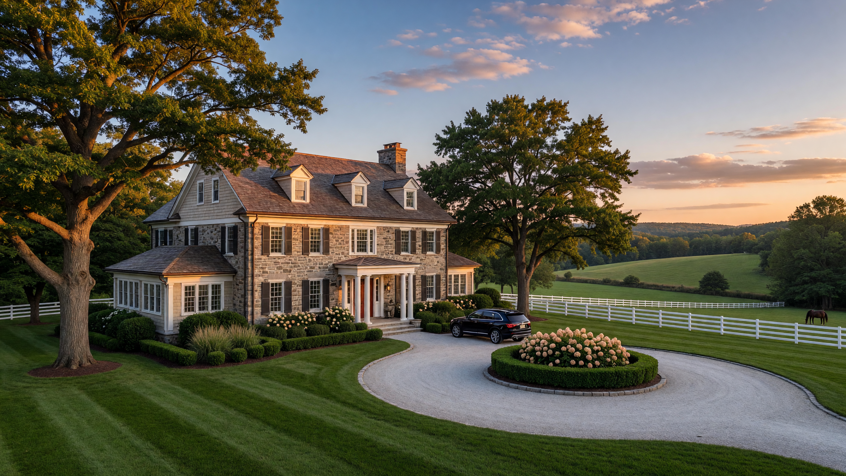 Luxury estate home in Saucon Valley with manicured grounds and rolling hills