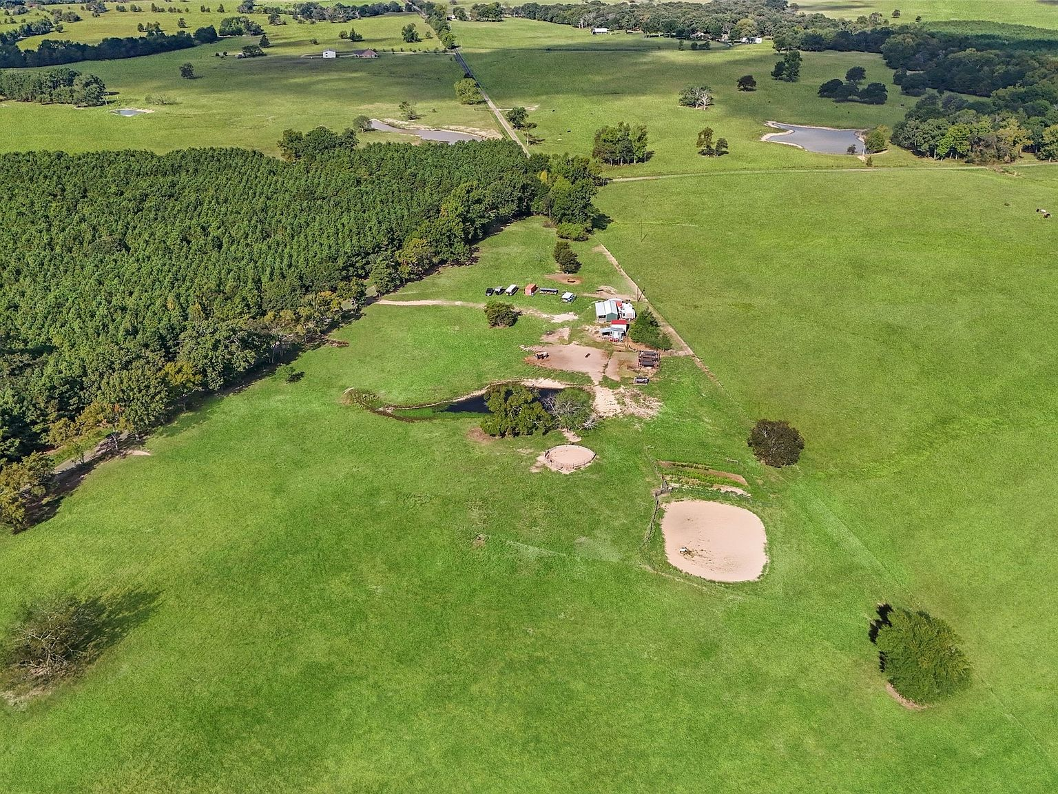 1786 County Road 1070, aerial view of 8-acre equestrian property