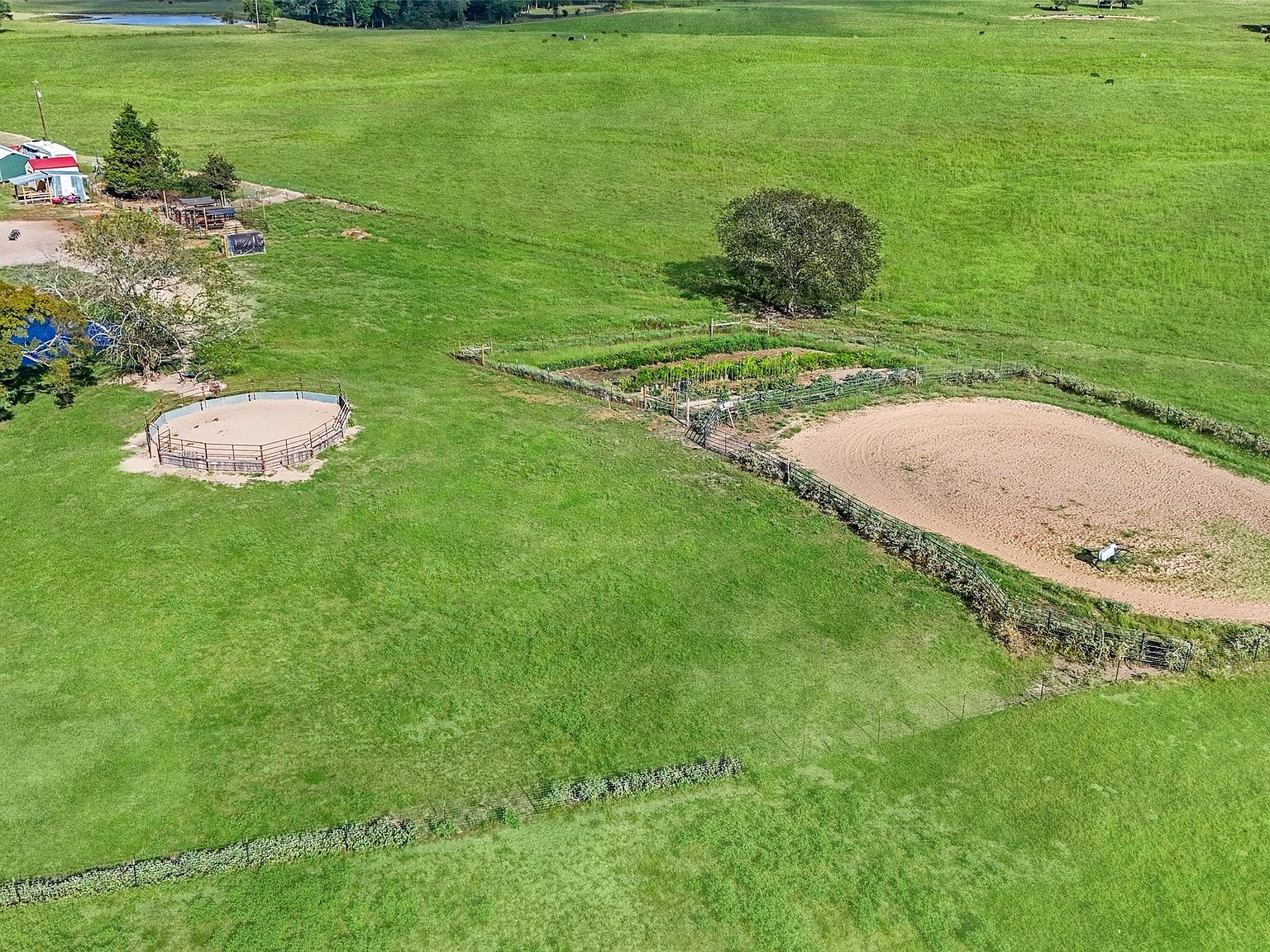 Aerial view of horse training facility and outbuildings