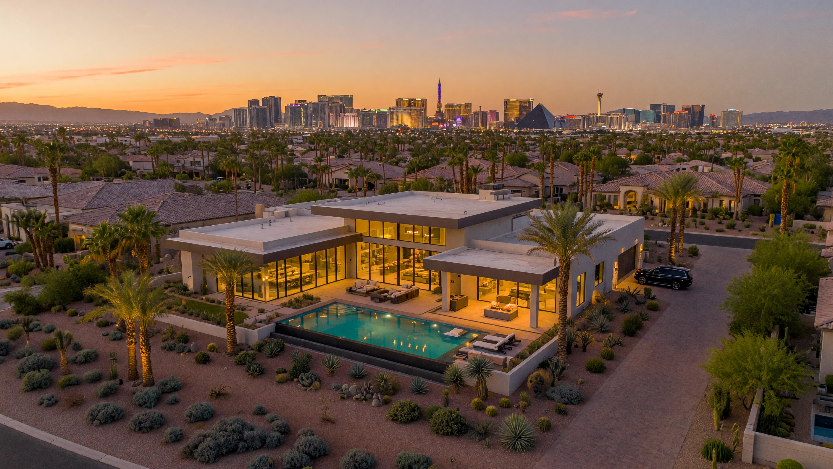 Luxury Las Vegas home with pool and mountain views at golden hour