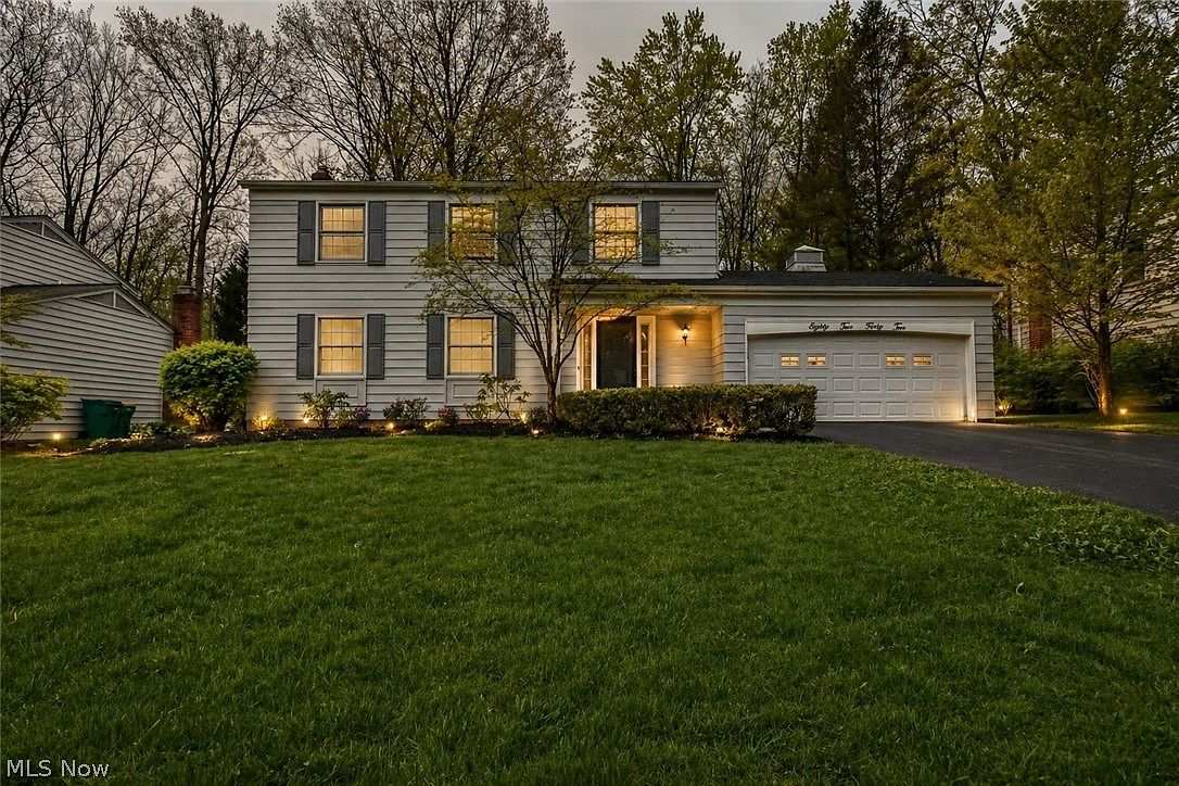 8242 Starburst Rd, Mentor, OH — twilight exterior of a home