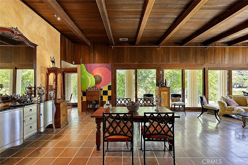 Open living and dining great room with natural light