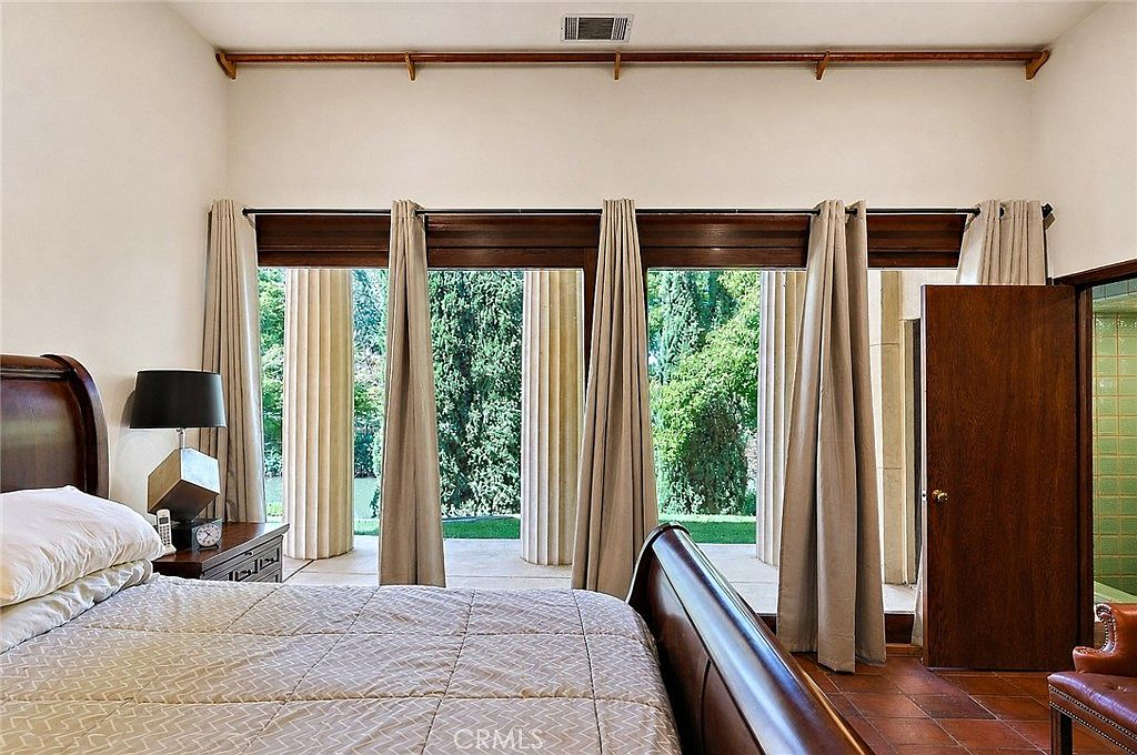 Master bedroom with column view overlooking the creek
