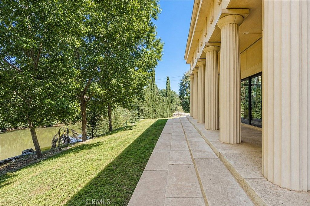 Neoclassical porch overlooking Bear Creek