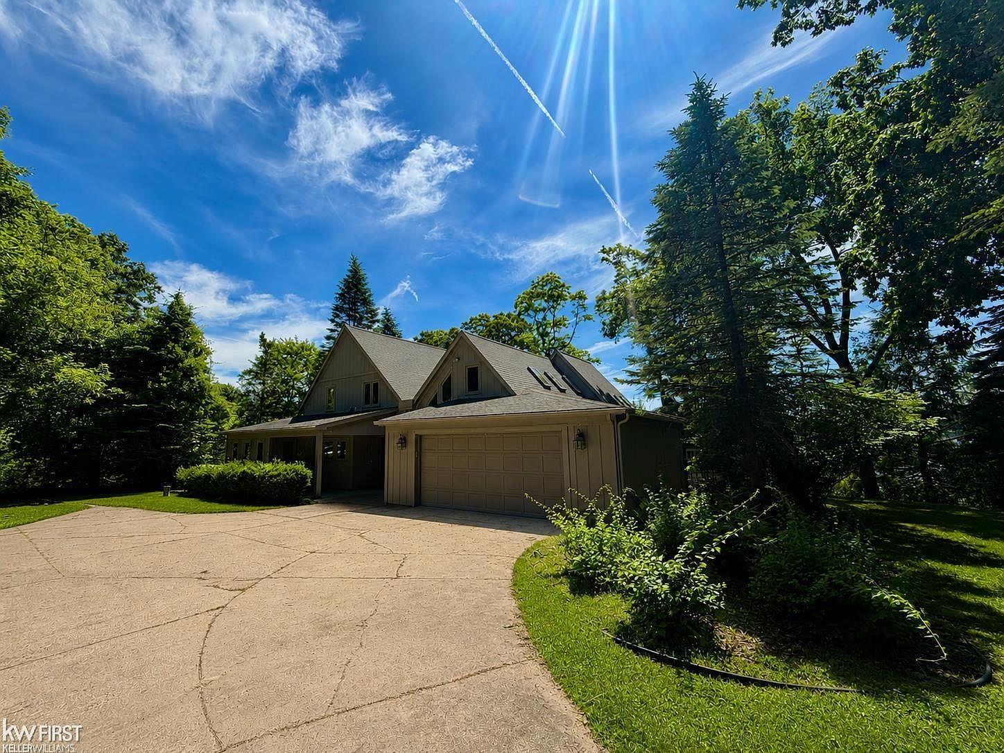 Front exterior facade of a home at 11820 Big Lake Road in Davisburg, Michigan