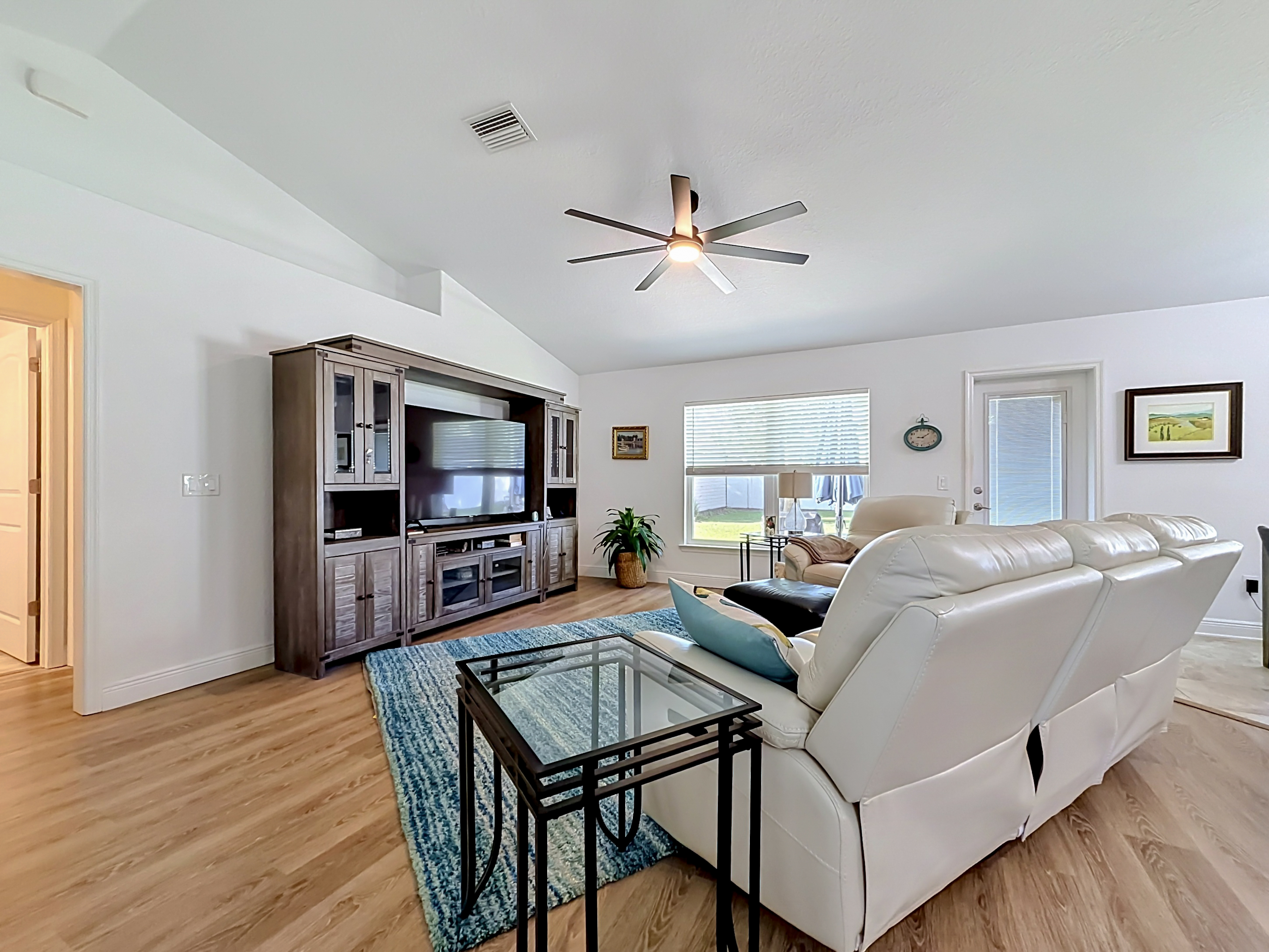 Living room with vaulted ceilings