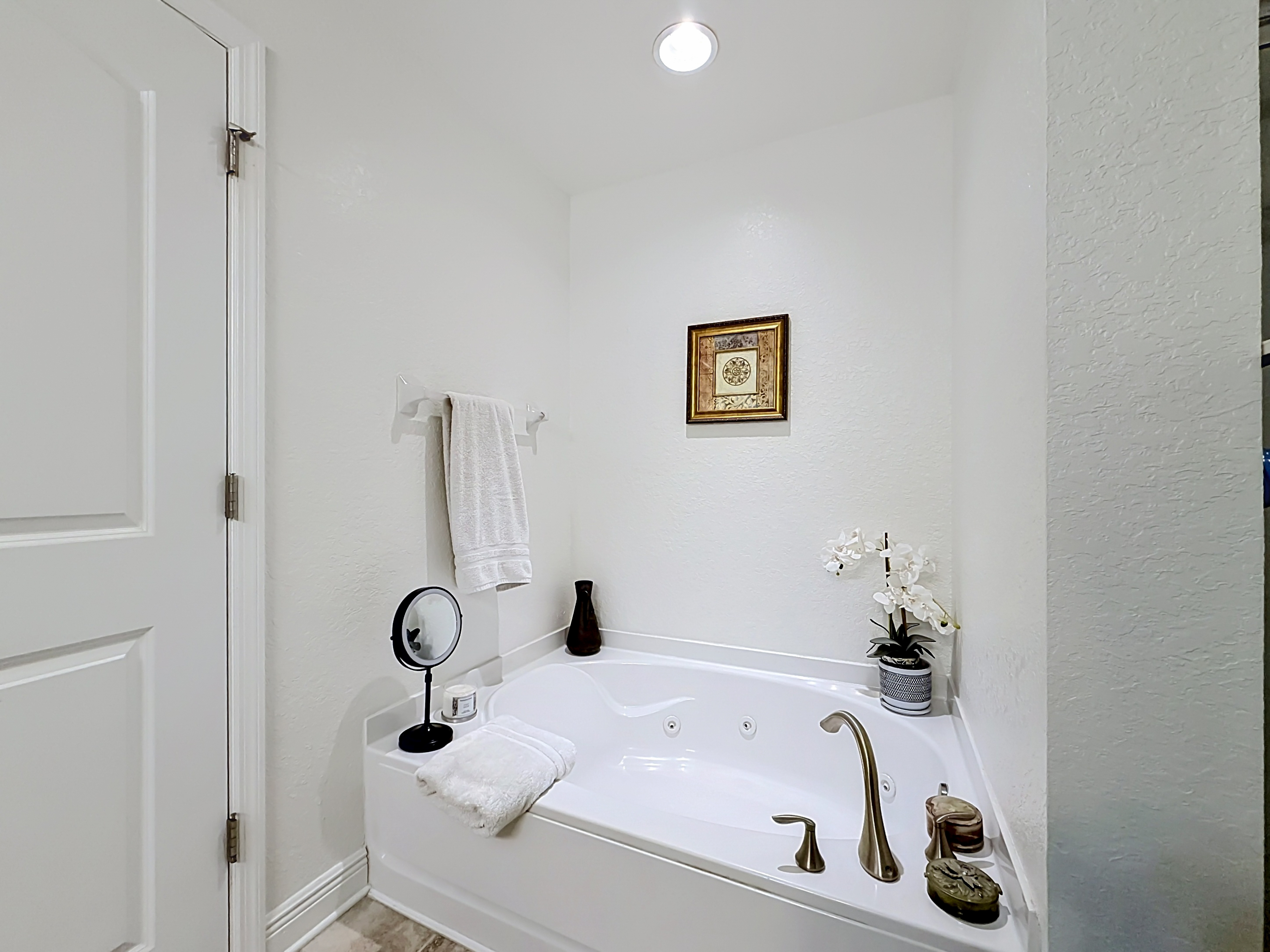 Soaking tub in master bathroom