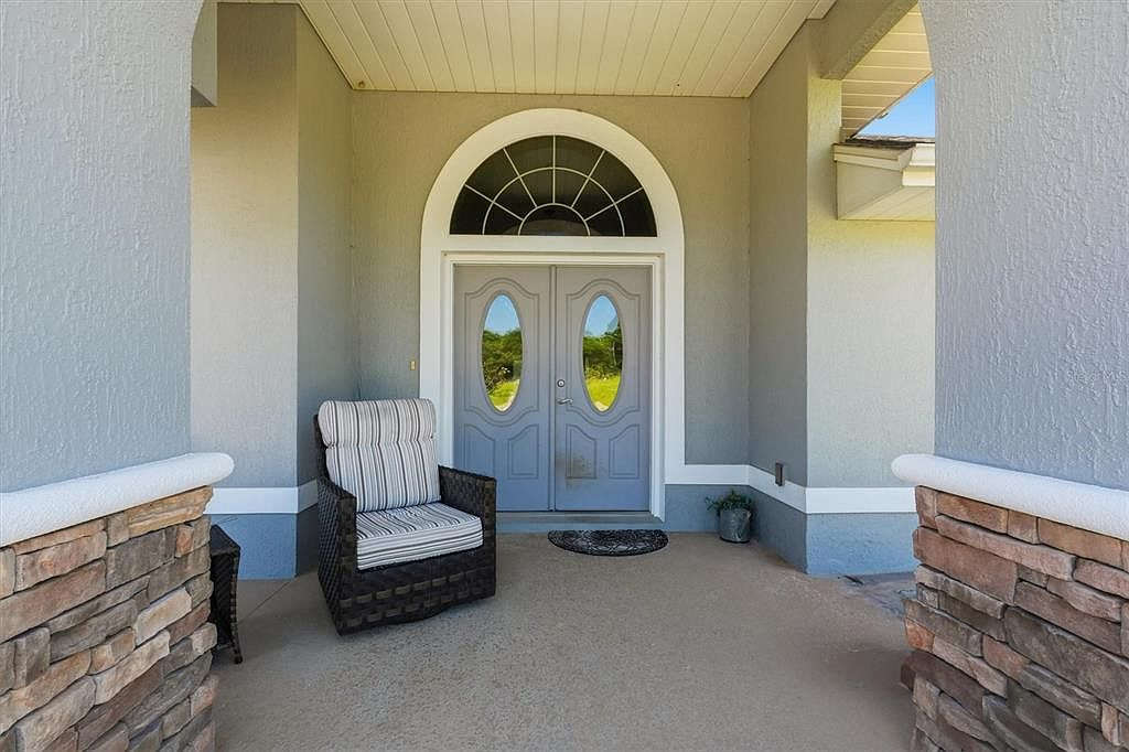 Front porch with stone-accented columns