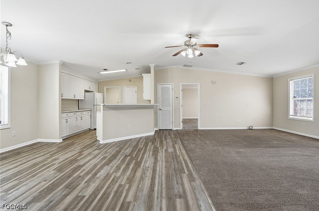 Open-concept living area flowing into the kitchen