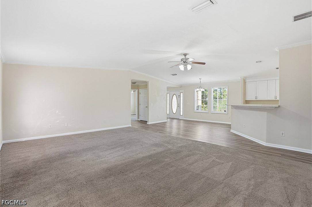 Living room with natural daylight from the front entry