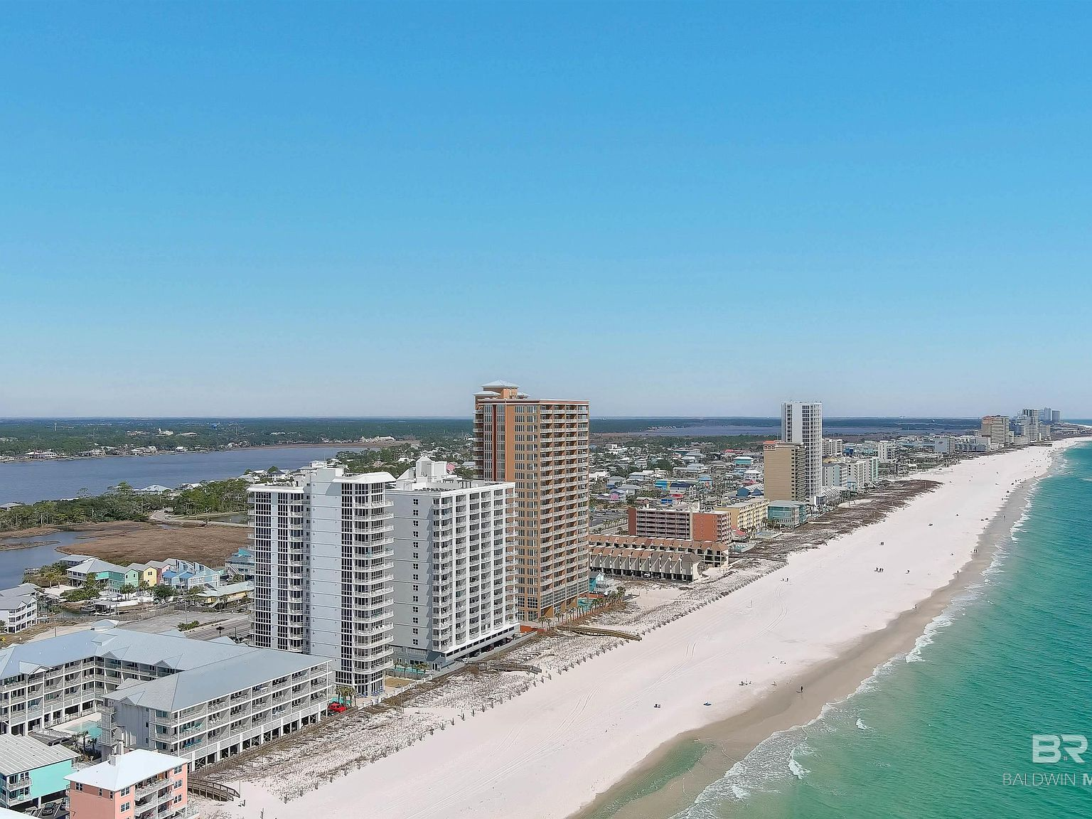 Aerial view of the Gulf Shores coastline and beachfront condos
