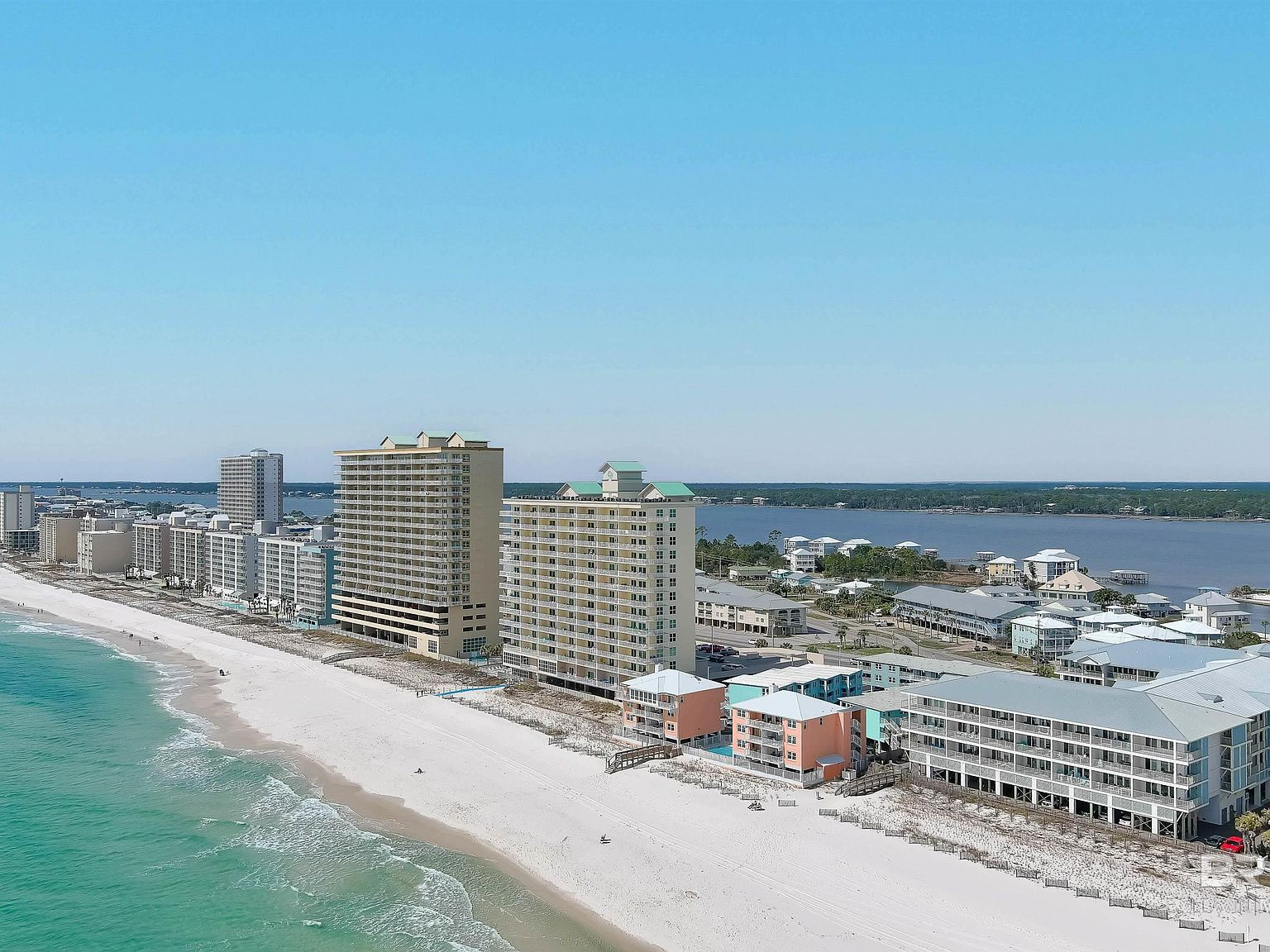 Aerial view of the Gulf Shores beachfront and low-rise condos