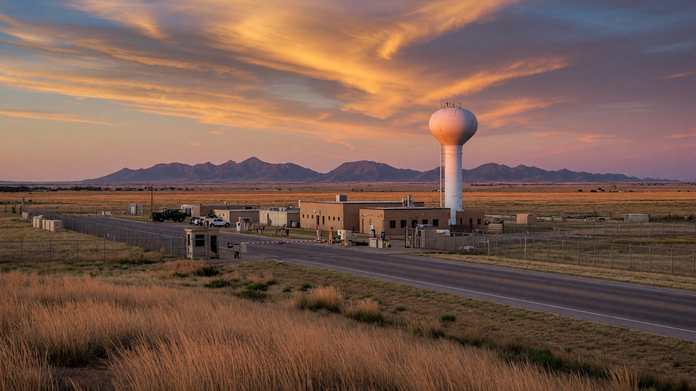Scenic view of Fort Sill military installation with Oklahoma prairie and Wichita Mountains in the background at golden hour