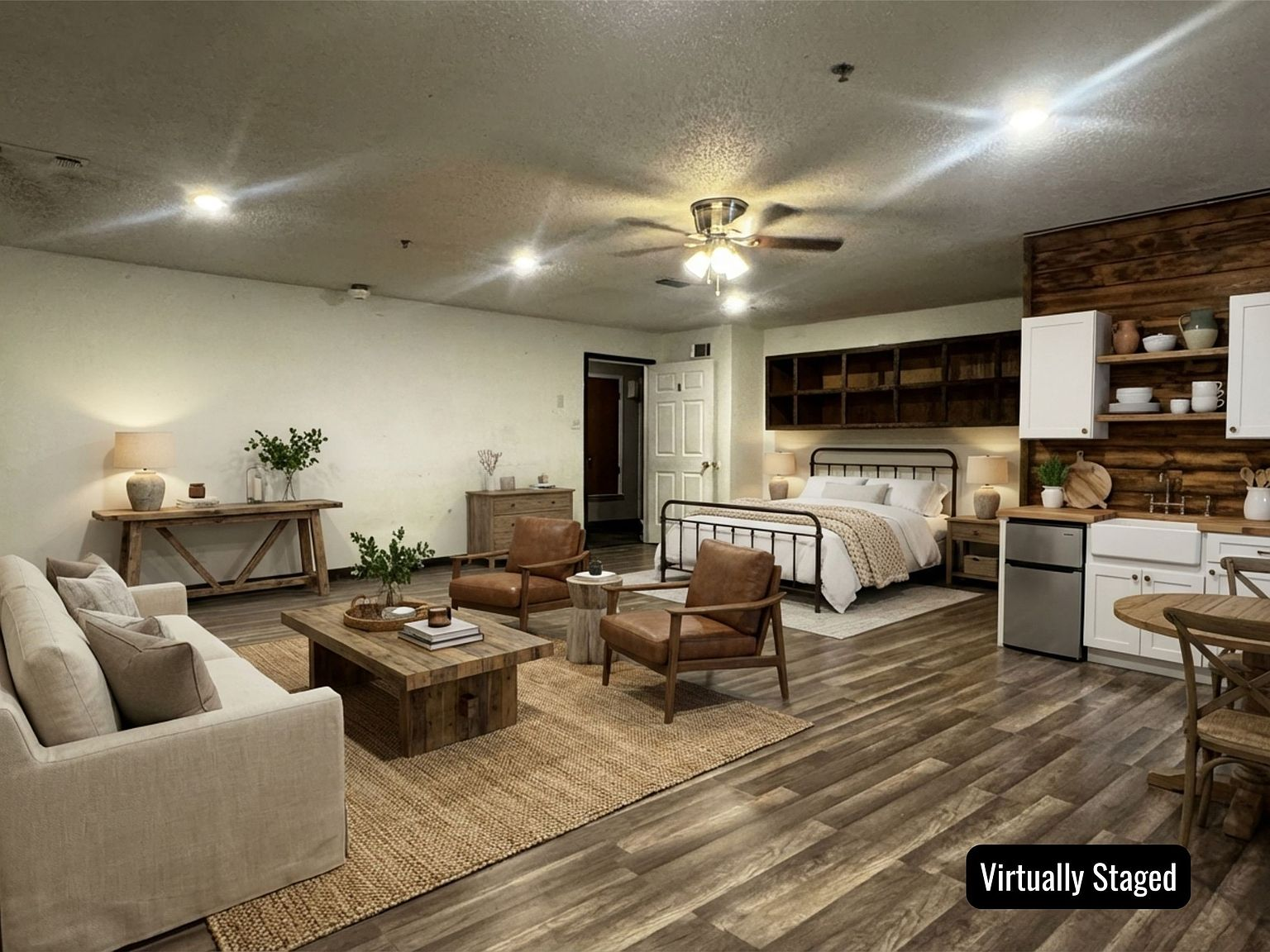 Studio flex space with wood plank accent wall and luxury vinyl plank flooring