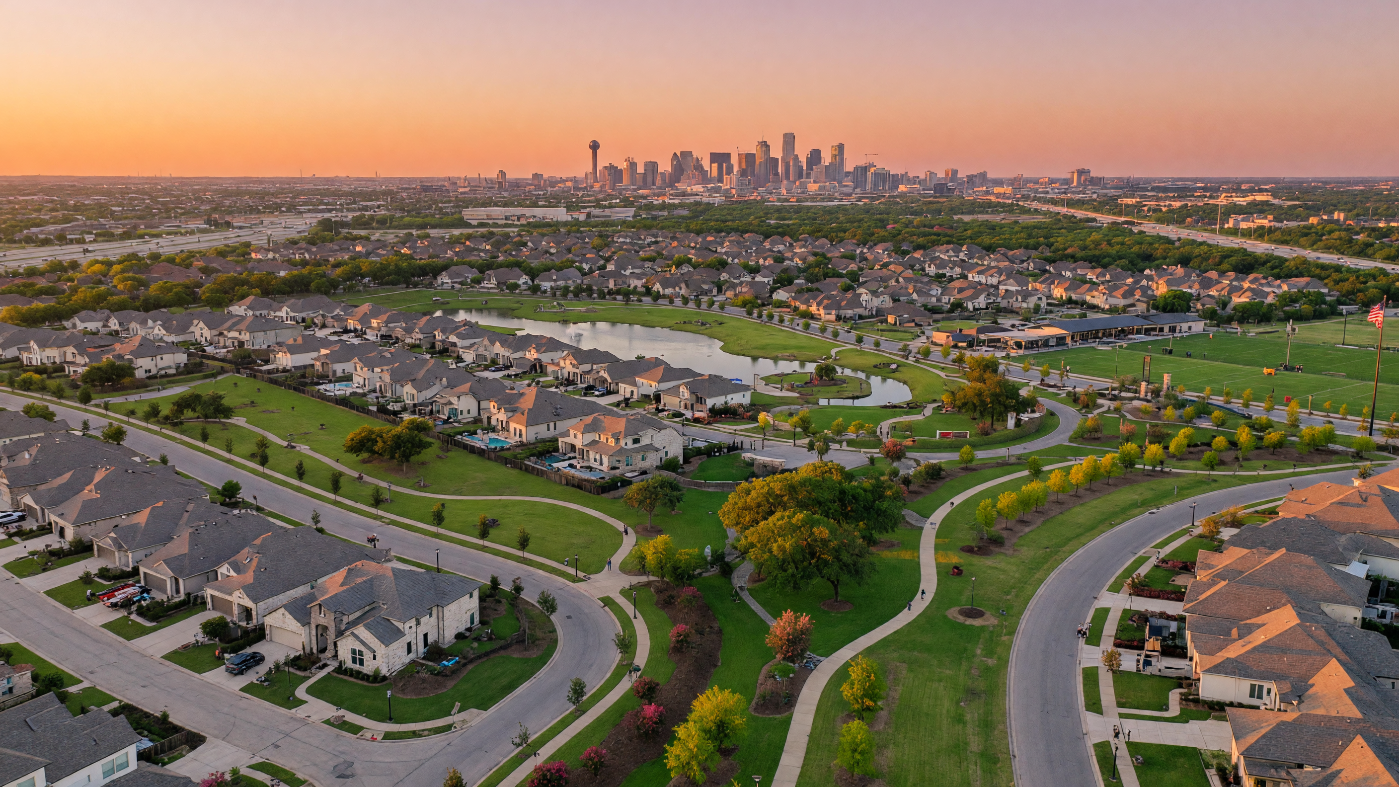 Aerial view of beautiful new homes and communities across Collin County Texas at golden hour