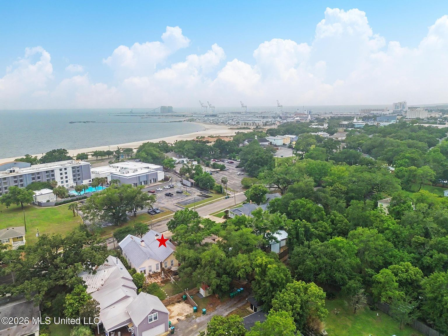 Aerial view of the Gulfport coastline and harbor near the property