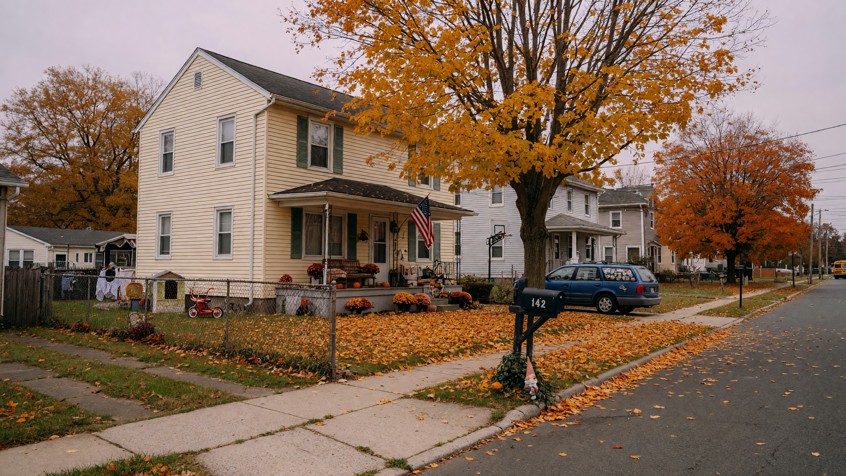 Suburban residential home in Passaic County, New Jersey with mature trees and a quiet neighborhood setting