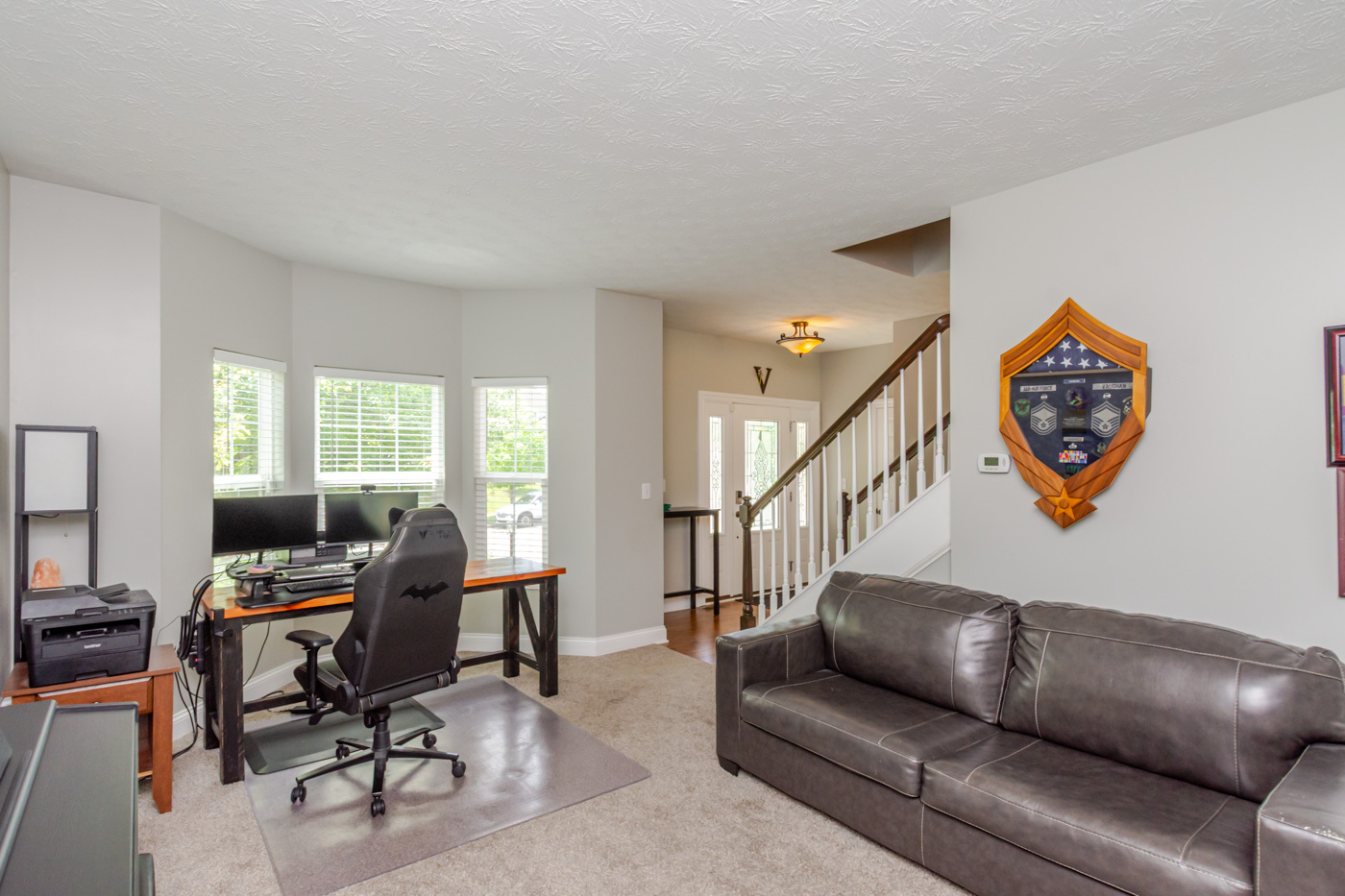 Formal living room with bay window