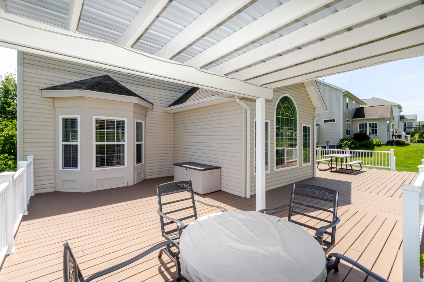 Backyard elevated deck with pergola