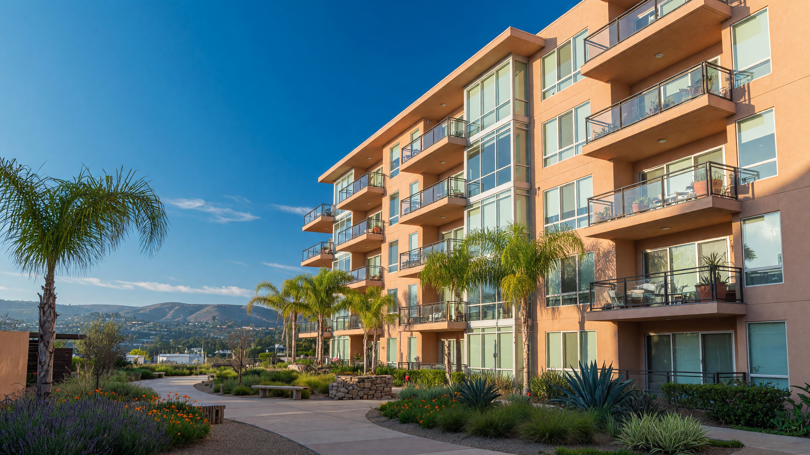 Modern multifamily apartment complex in San Diego with contemporary architecture and landscaped courtyard