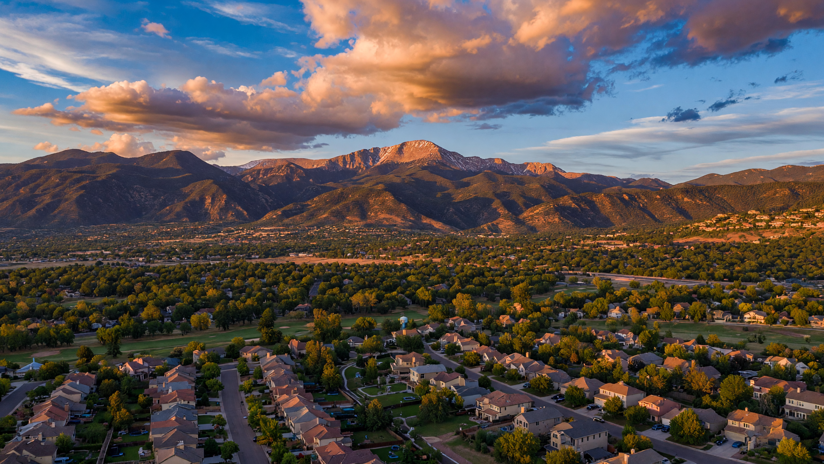 Colorado Springs skyline with Pikes Peak at golden hour