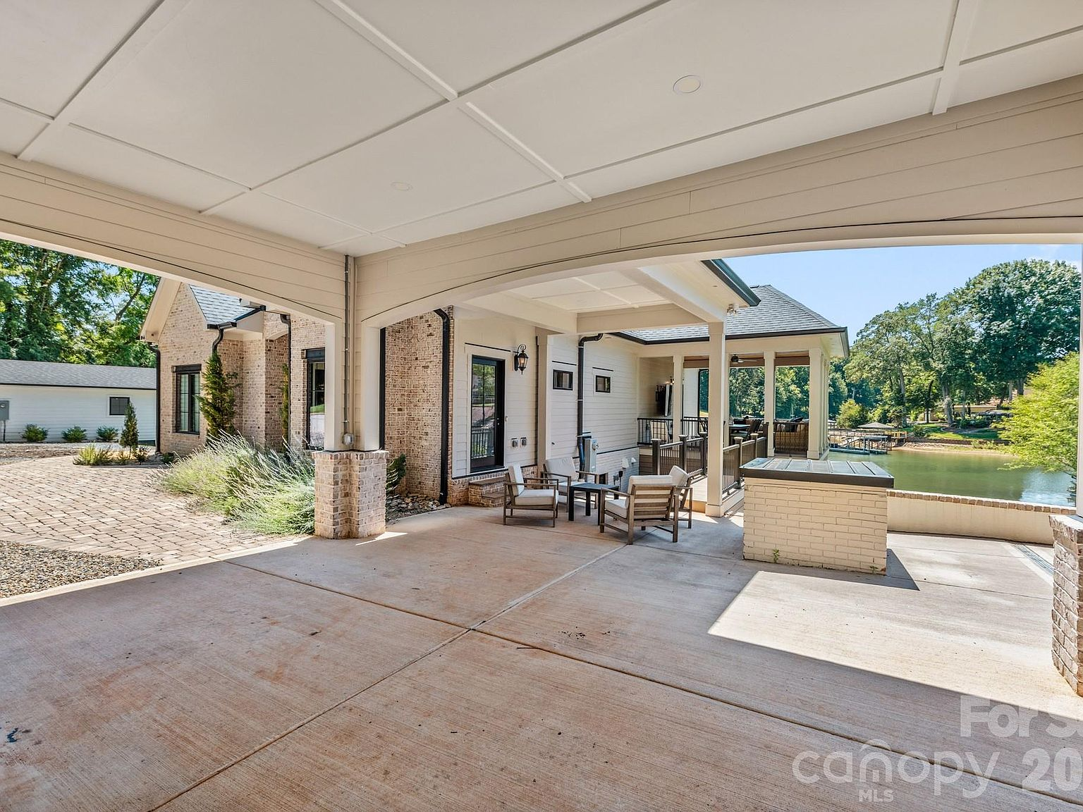 Covered porte-cochere with lake views