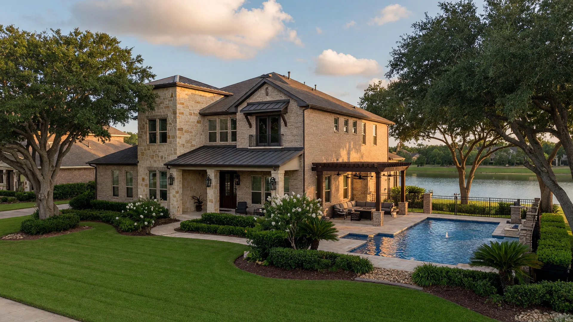 A modern two story home in Falls at Dry Creek, Cypress Texas with a covered patio, swimming pool, and mature landscaping