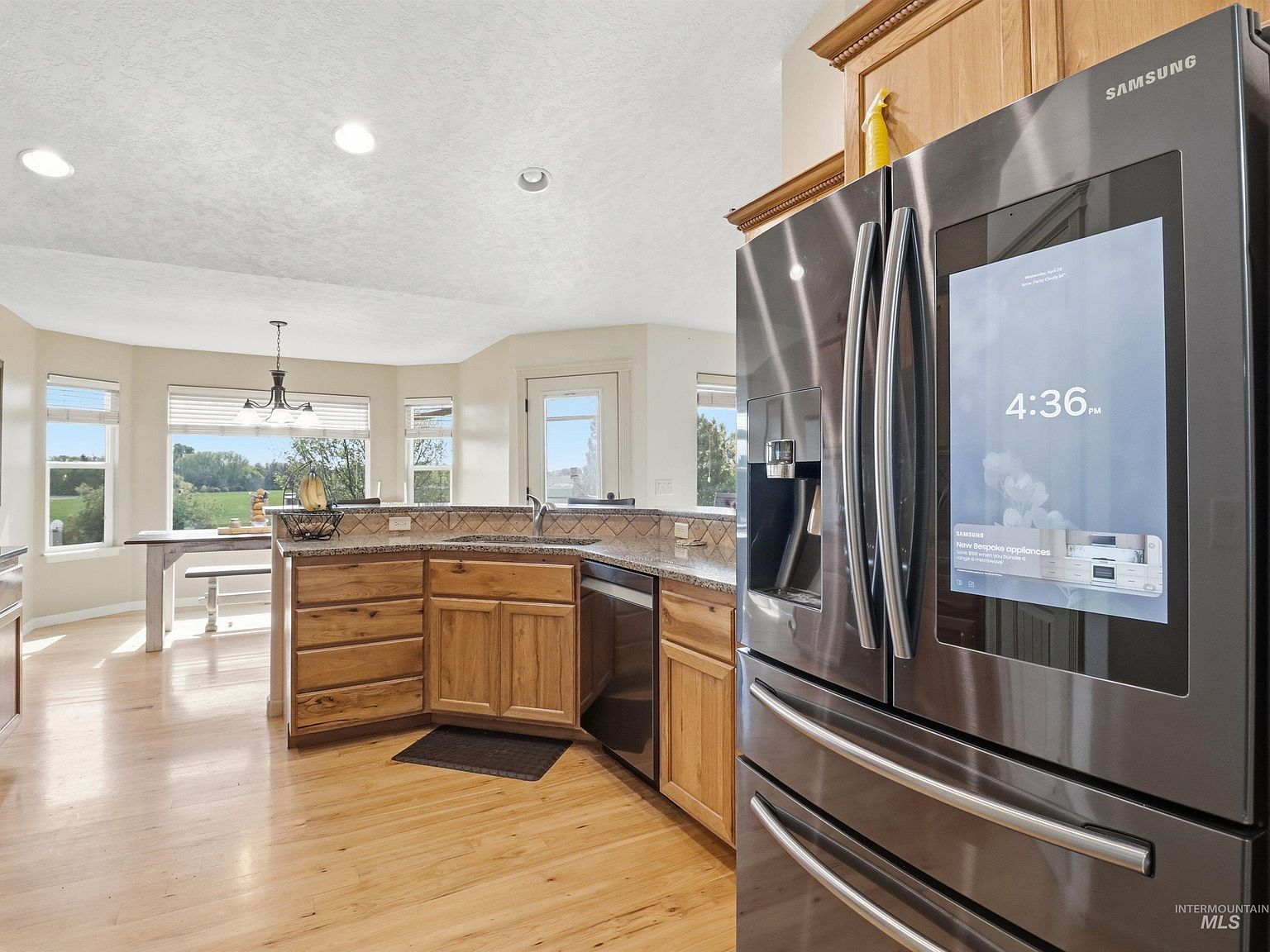 Kitchen with bay windows and dining area