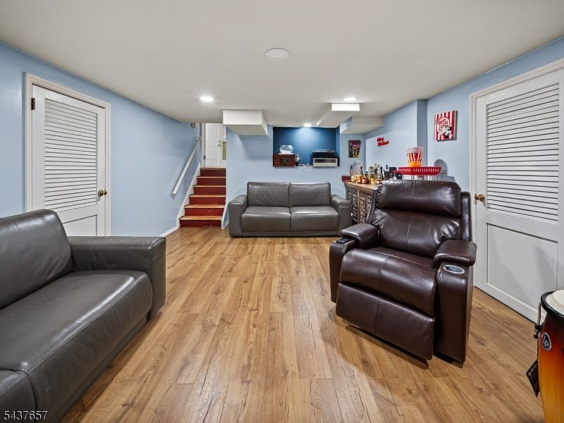 Lower-level media room at 17 Ravine Ct Clifton NJ
