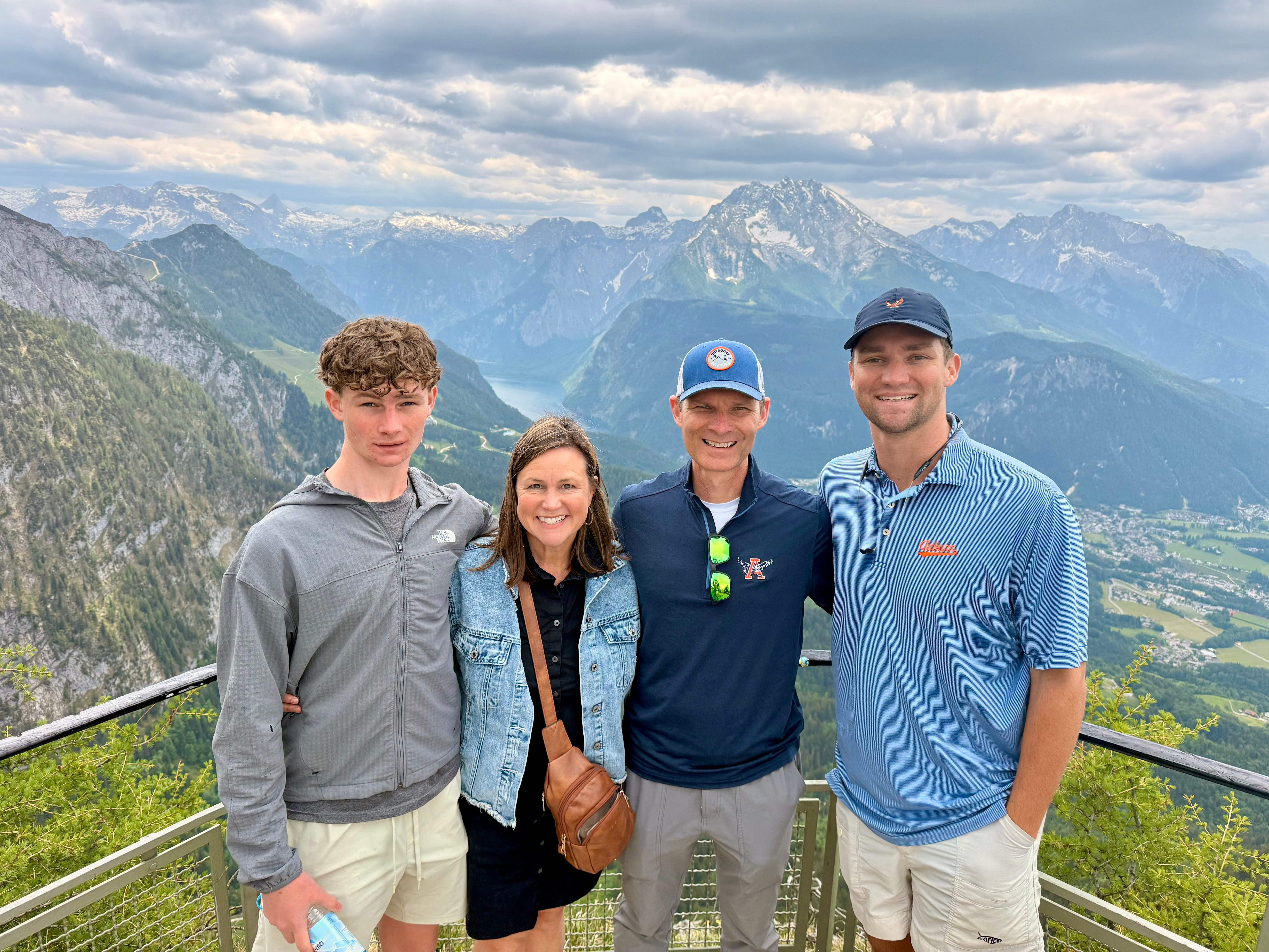 Rozi Dover and her family posing together at a mountain viewpoint