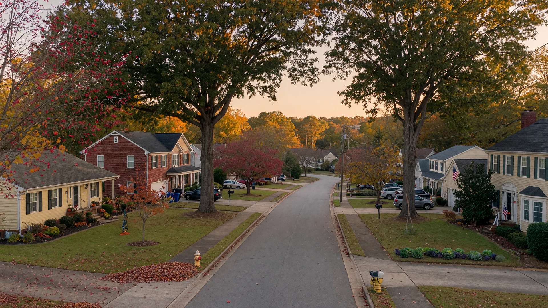 Tree-lined residential street in Lilburn, Georgia during golden hour