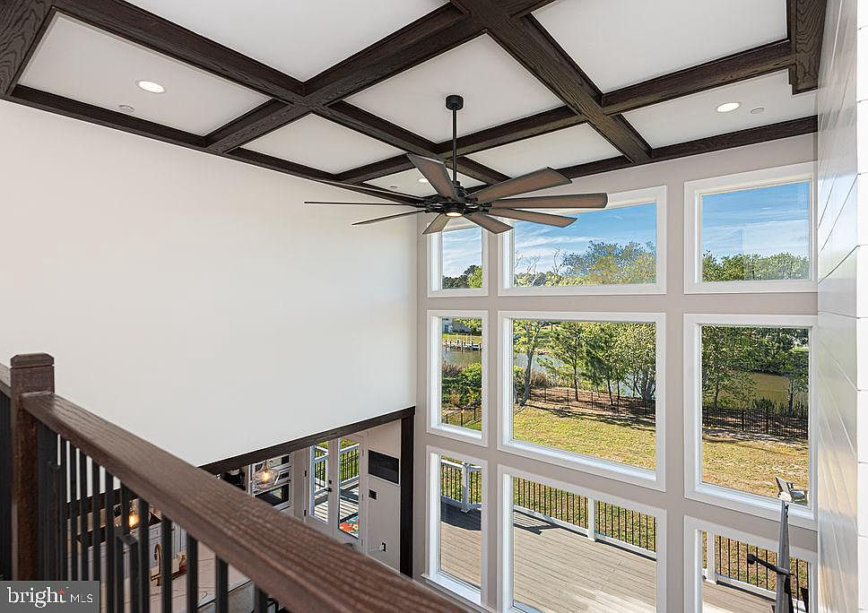 Third-level catwalk overlooking the two-story living area