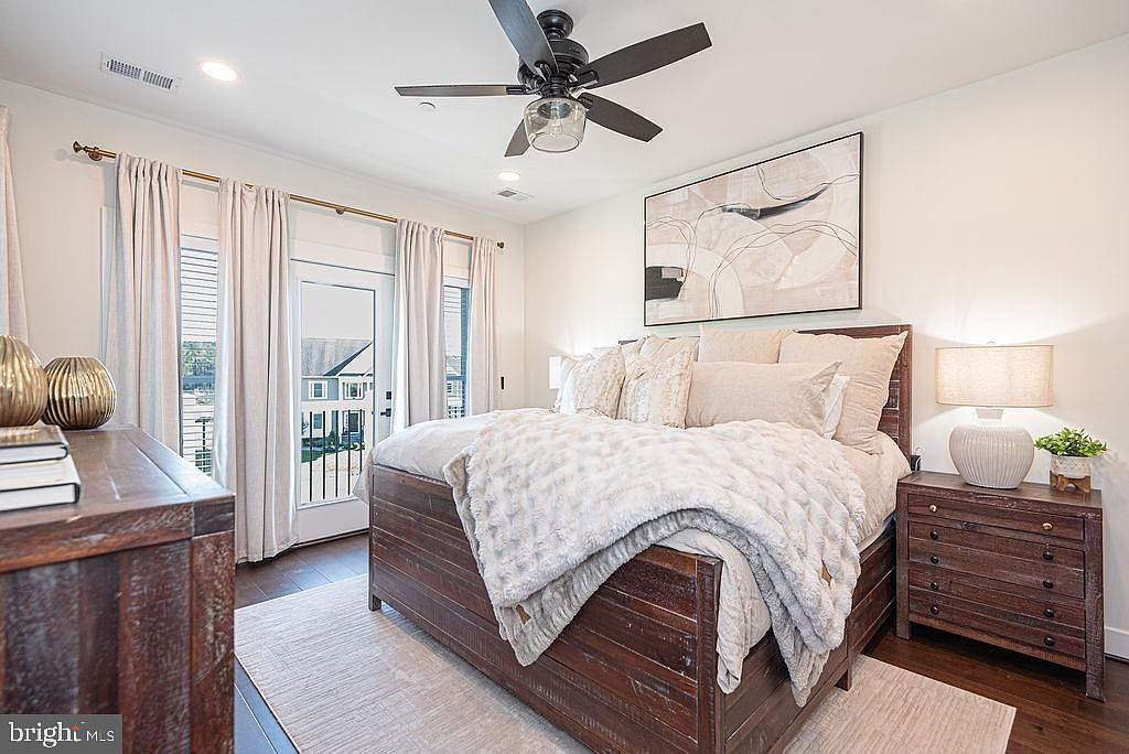 Primary suite with cathedral ceilings and natural light