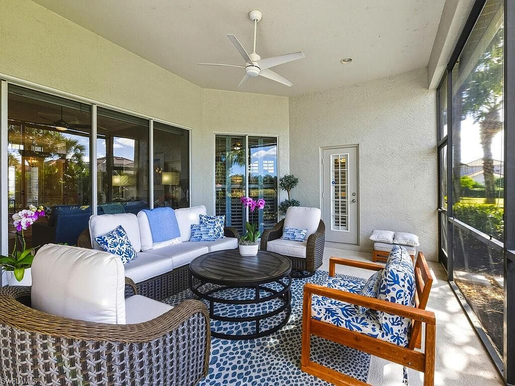 Screened lanai with water view and fountain