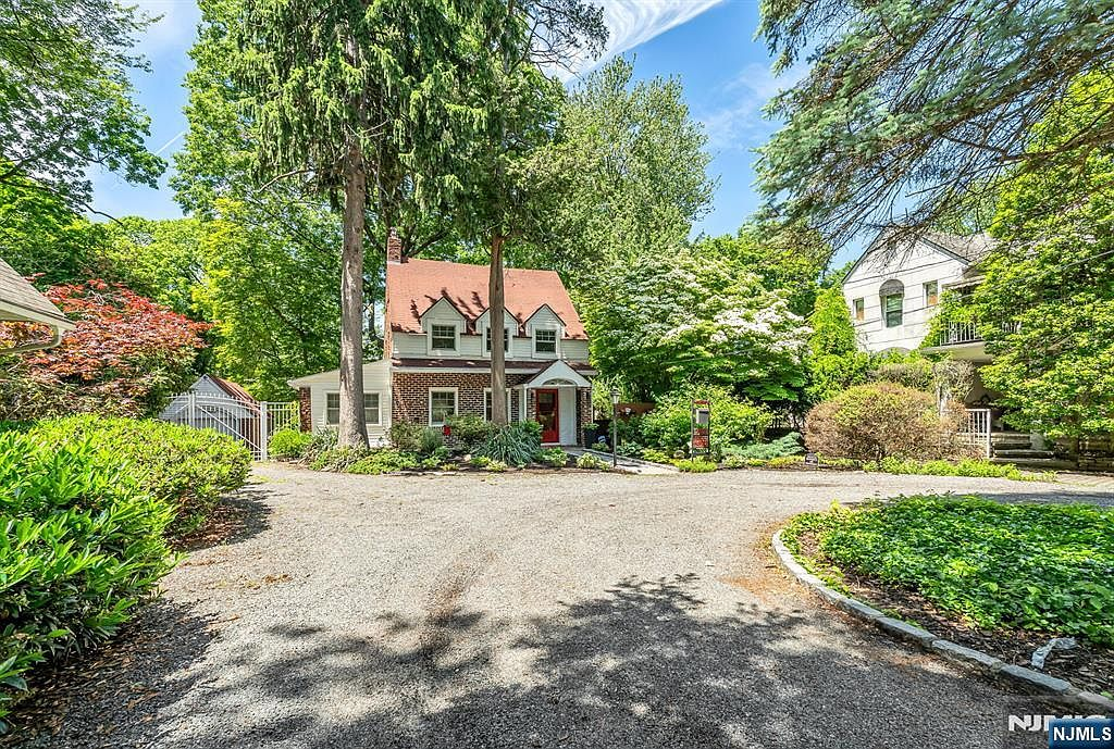 Dutch Colonial cottage exterior at 740 River Rd, Teaneck NJ