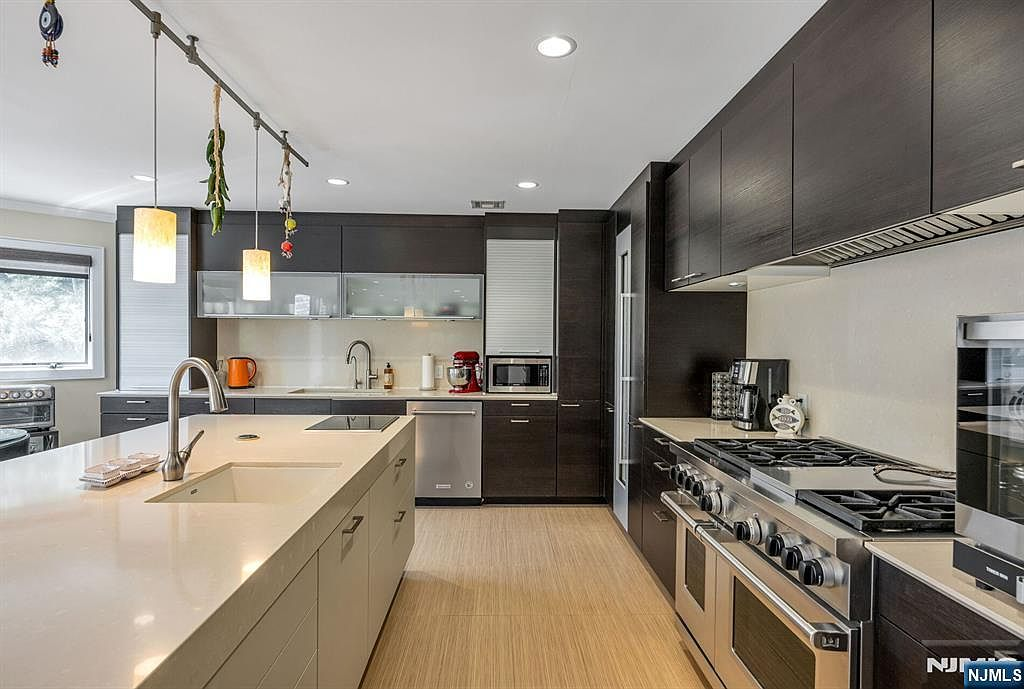 Kitchen with Caesarstone counters and custom Wenge cabinetry