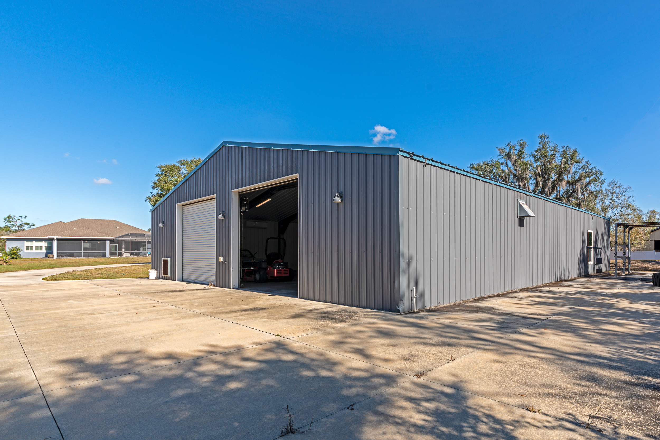 Exterior of the approximately 3,000-square-foot flex building with large bay doors