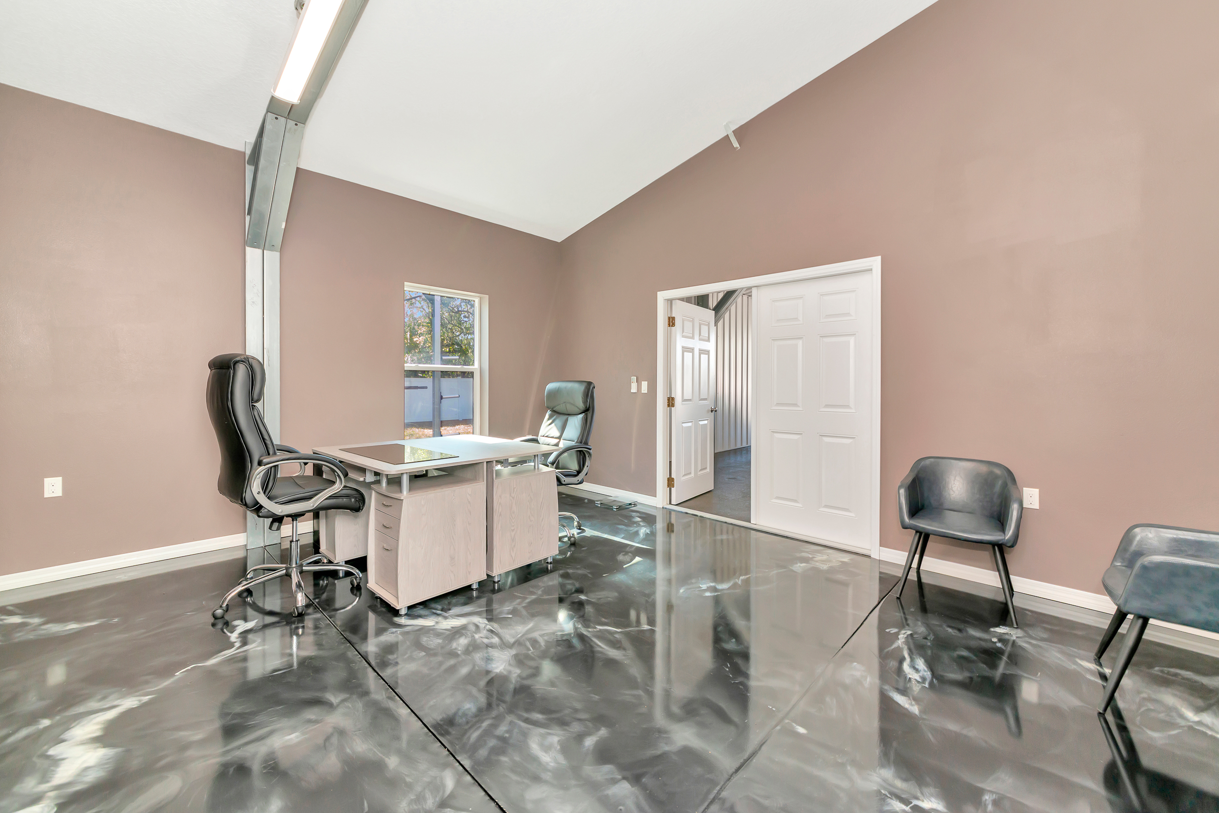 Finished executive office within the flex building with an adjoining bath