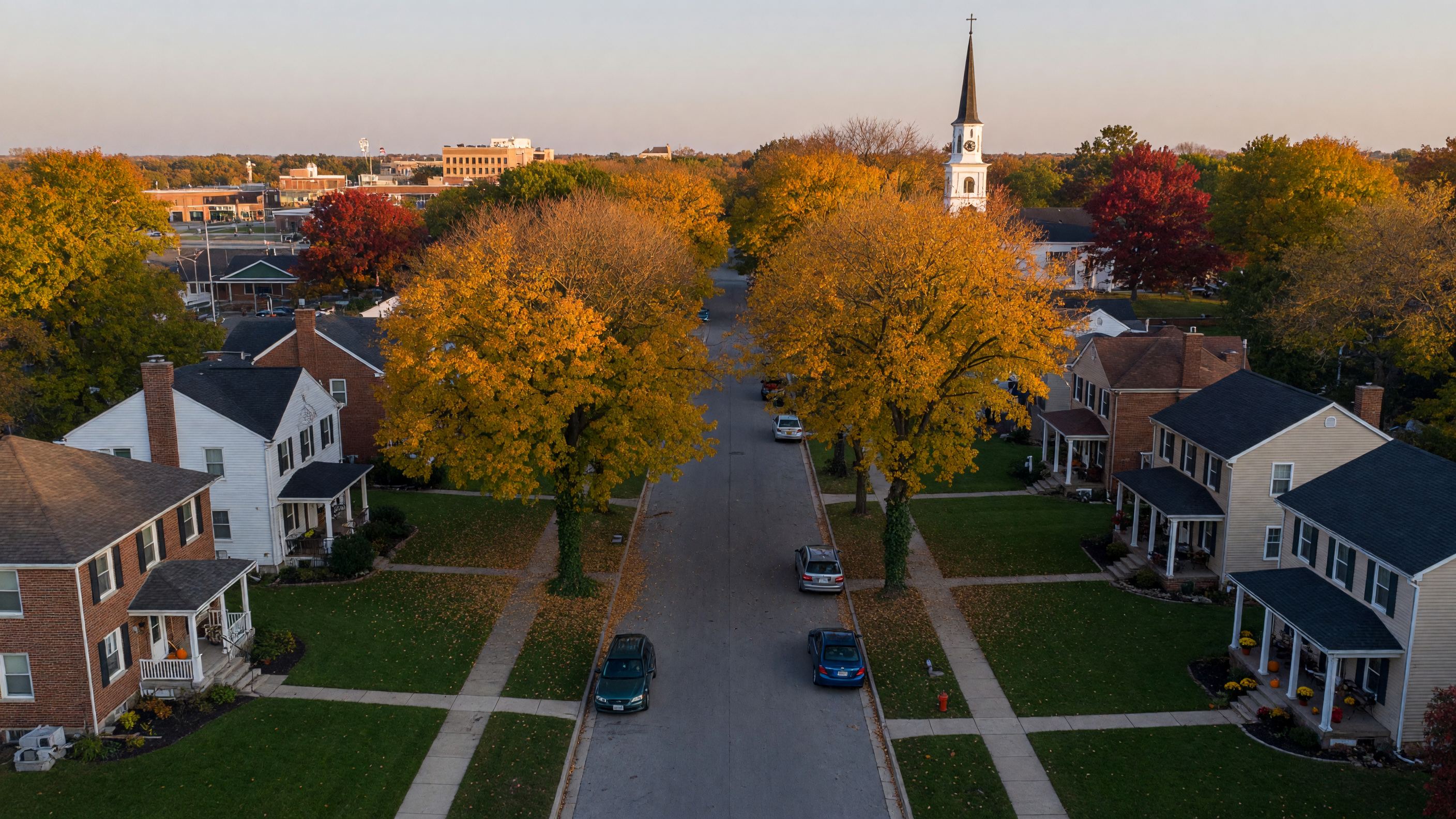 Tree-lined residential street in Park Ridge, Illinois with mature autumn foliage