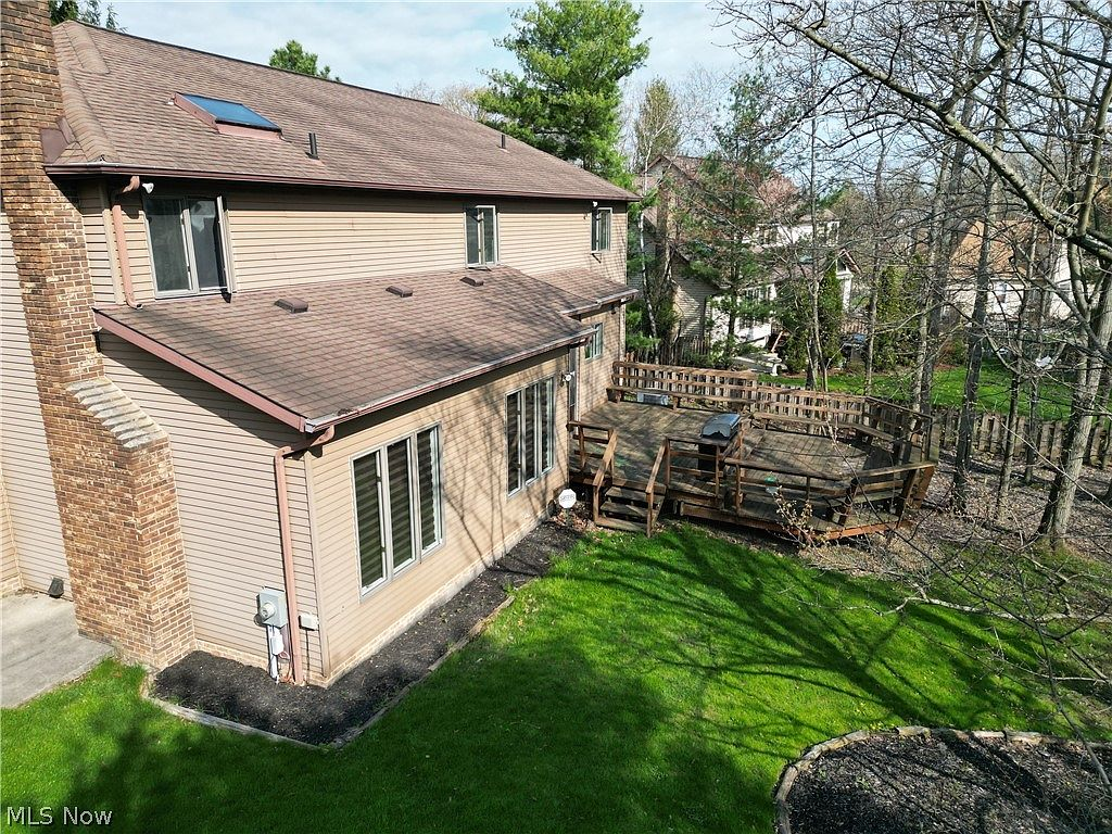Backyard deck with multi-level wooden structure